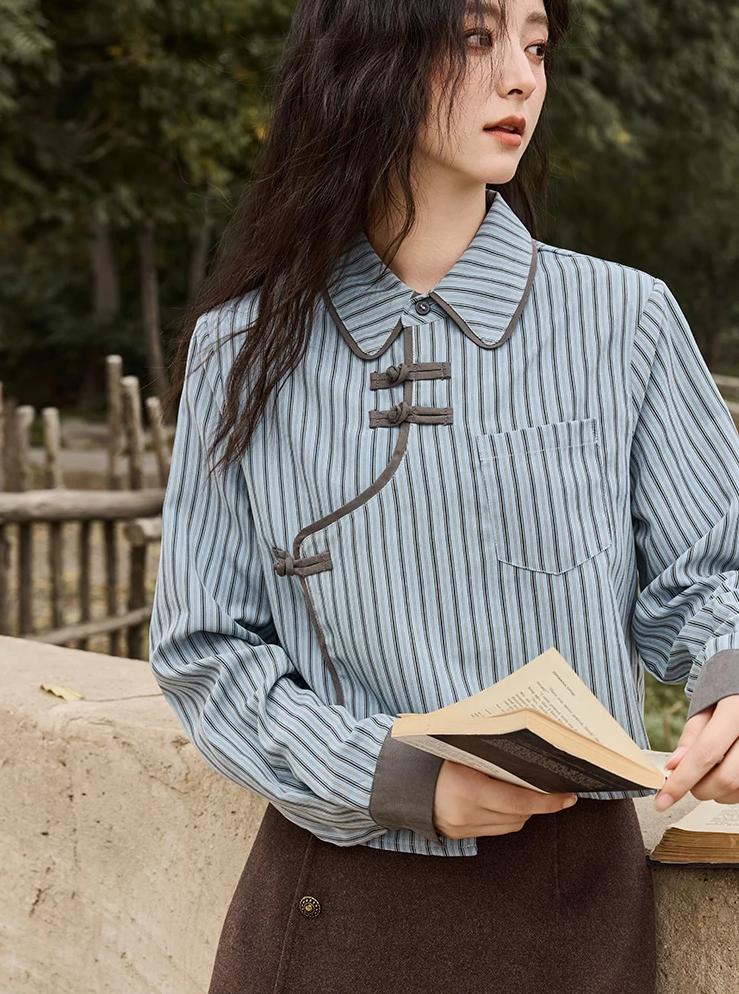 Blusa de patchwork con rayas de color azul y gris