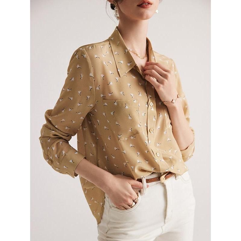 Blusa elegante estampada de seda