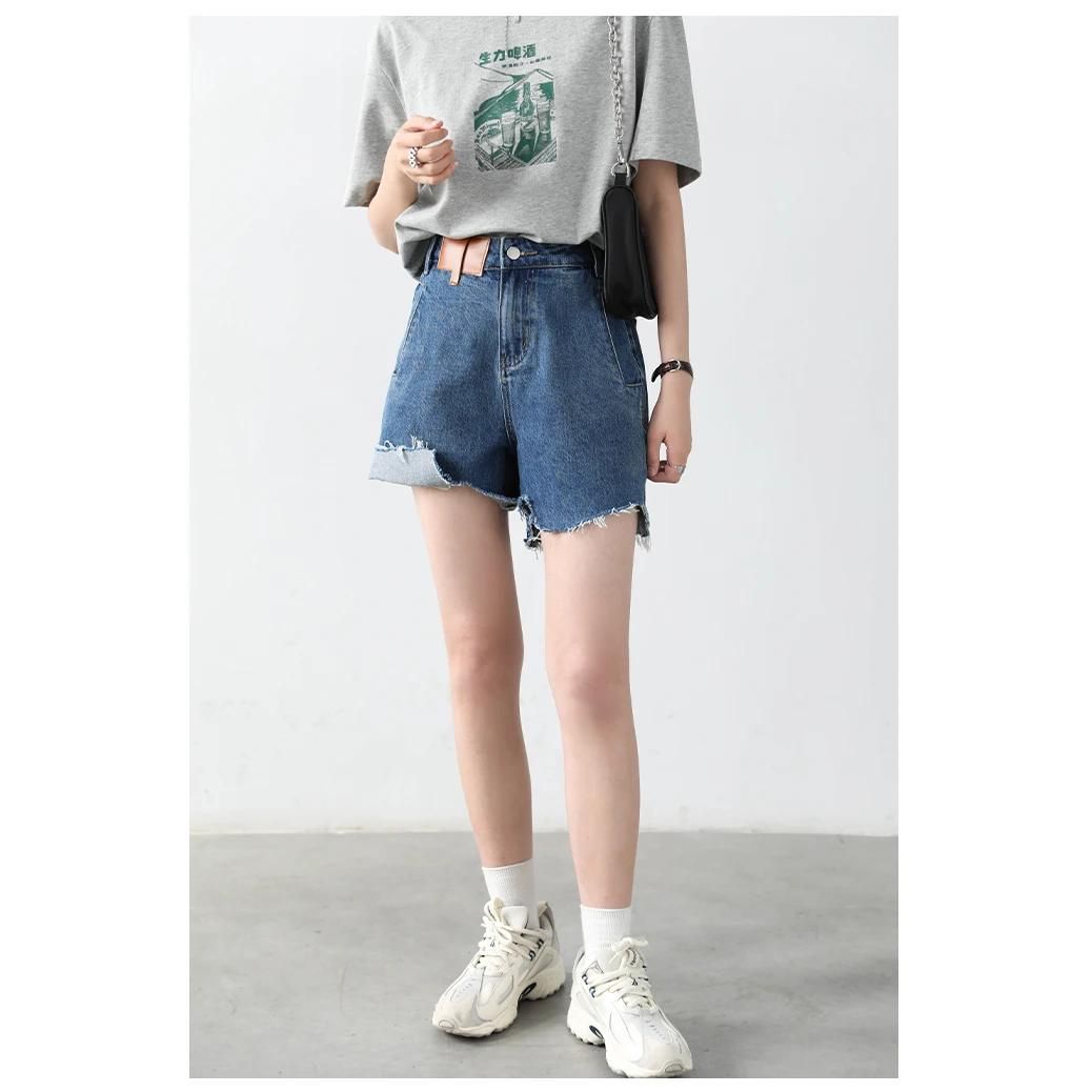 Retro-blaue Jeansshorts mit hoher Taille für Damen