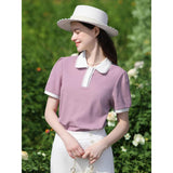 Camiseta elegante de verano con cuello tipo polo y manga abullonada