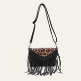 Bolso bandolera bohemio con estampado animal y flecos con borlas