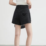 Jeansshorts mit hoher Taille und asymmetrischem Saum