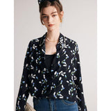 Elegante blusa de seda floral azul marino