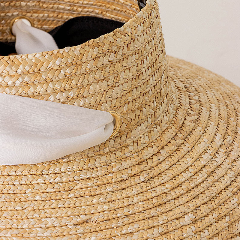 Elegante sombrero de paja de playa de verano de ala ancha