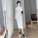 Vestido midi de punto de manga larga con cuello alto