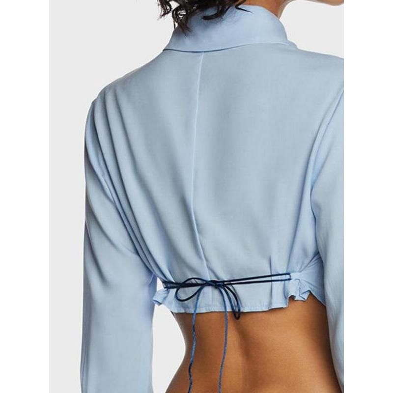 Chic Blue Lace-Up Back Blouse with V-Shaped Hem