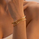 Brazalete multicapa de acero inoxidable bañado en oro de 18 quilates