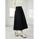 Falda midi elegante de algodón negra con bolsillos