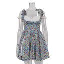 Vestido de tirantes con abertura y estampado floral de parches