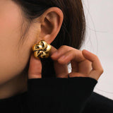 Aretes con forma de flor de acero inoxidable chapado en oro de 18 quilates