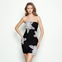 Vestido palabra de honor negro con bordados florales