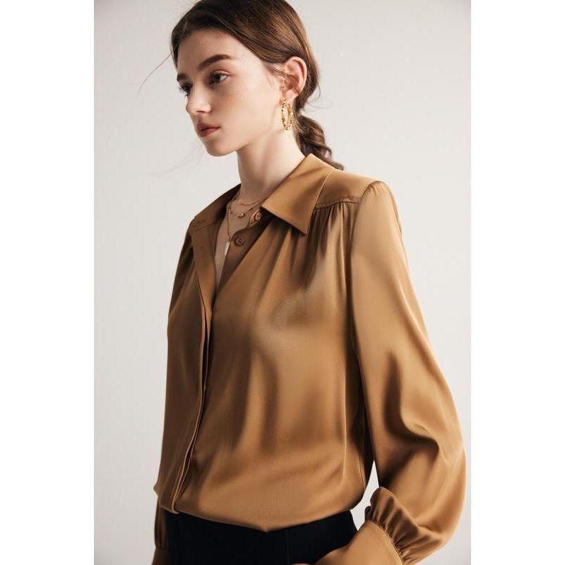 Elegante blusa de seda de manga larga para mujer