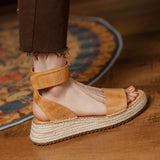 Sandalias de plataforma de cuero elegantes