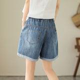 Haremsshorts aus Denim mit Blumenstickerei