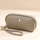 Elegante cartera de piel auténtica con borlas para mujer