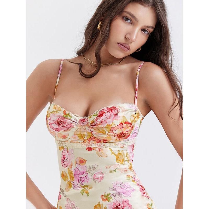 Vestido midi con estampado floral, tirantes finos y diseño sin espalda