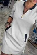 Vestido midi de poliéster con cuello redondo y bolsillos con cremallera