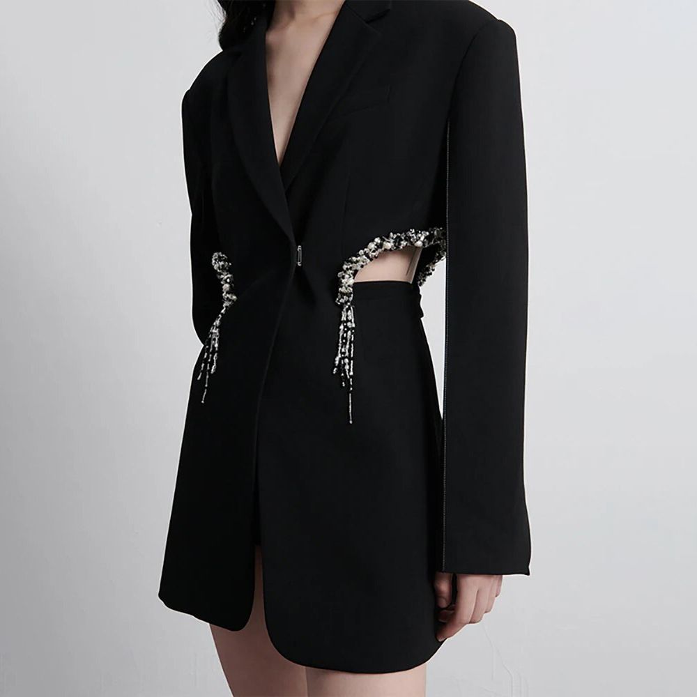 elegante blazer de mujer ahuecado con adornos de cristal