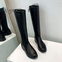 Botas altas negras de punta redonda de poliuretano para mujer