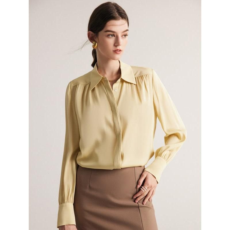 Elegante blusa de seda de manga larga para mujer