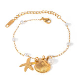 Pulsera con colgante de estrella de mar y perlas chapadas en oro de 18 quilates