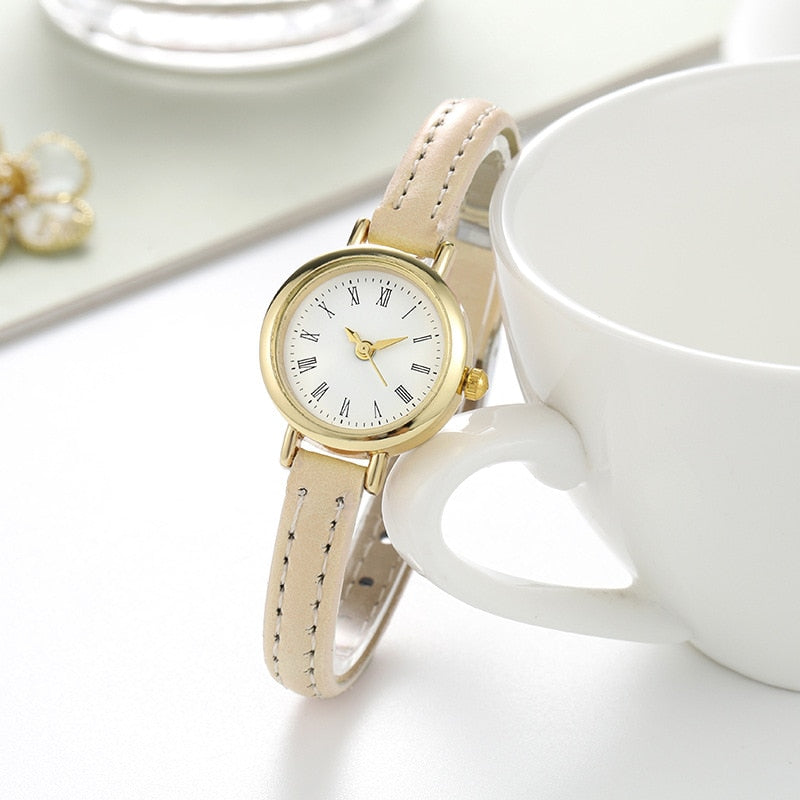 Elegante reloj de pulsera de cuarzo y cuero para mujer: diseño minimalista clásico