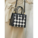 Elegante bolso de mano de piel auténtica