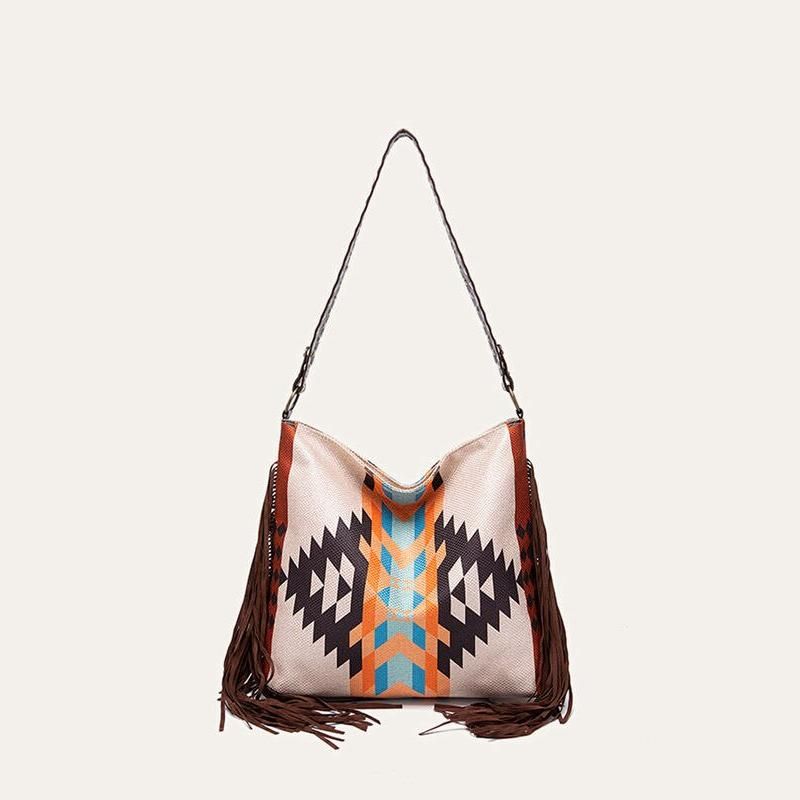 Bolso de hombro grande de lona bohemio chic con detalles de punto y borlas de colores