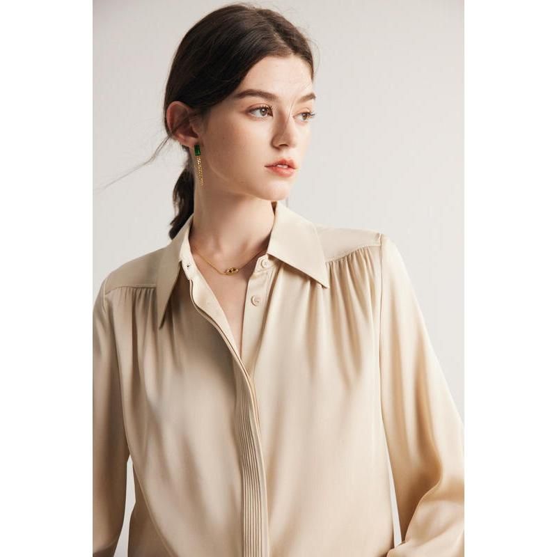 Elegante blusa de seda de manga larga para mujer