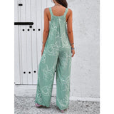 Elegant Wide-Leg Jumpsuit with Geometric Print and Suspenders