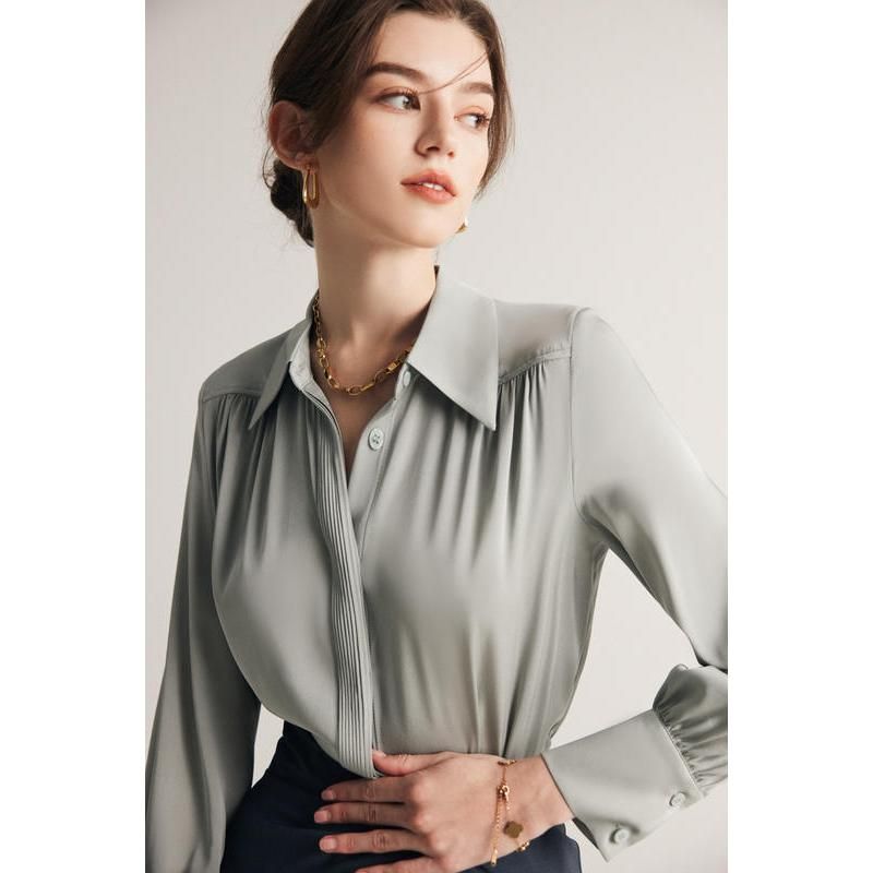 Elegante blusa de seda de manga larga para mujer