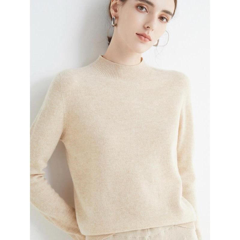 Lujoso jersey de lana merino con cuello simulado para mujer