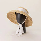 Elegante sombrero de paja de playa de verano de ala ancha