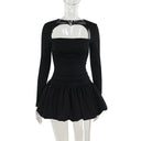 Vestido de manga larga con bajo abullonado negro