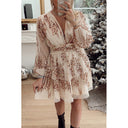 Vestido de corte en A con lentejuelas y manga larga