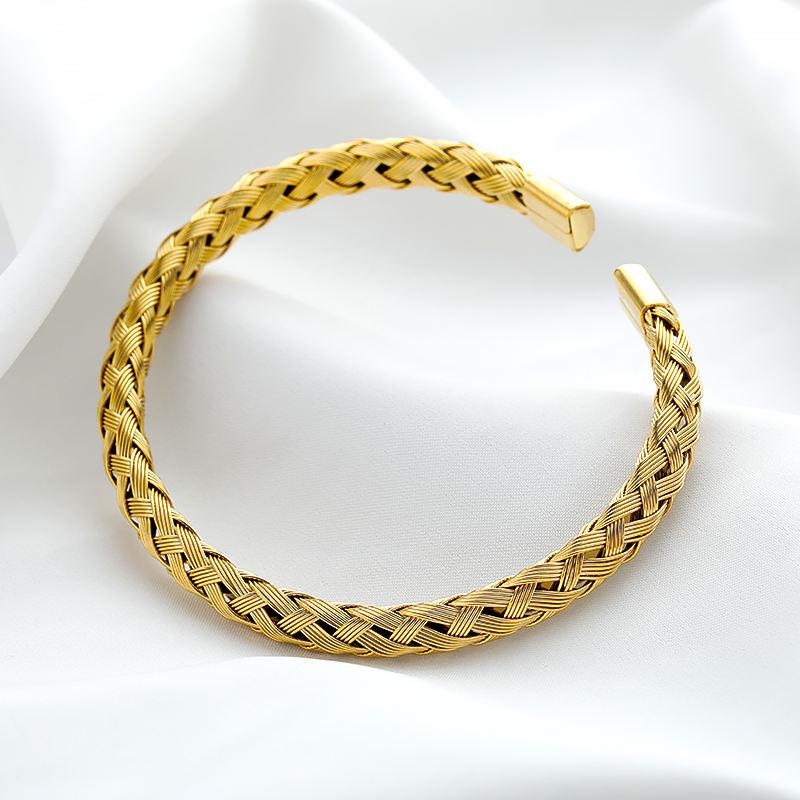 Gewebtes Charm-Armband aus Edelstahl und Gold