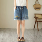 Haremsshorts aus Denim mit Blumenstickerei