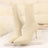 Socks And Knitted Boots In Autumn And Winter